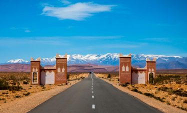 empty asphalt road and overlooking mountain